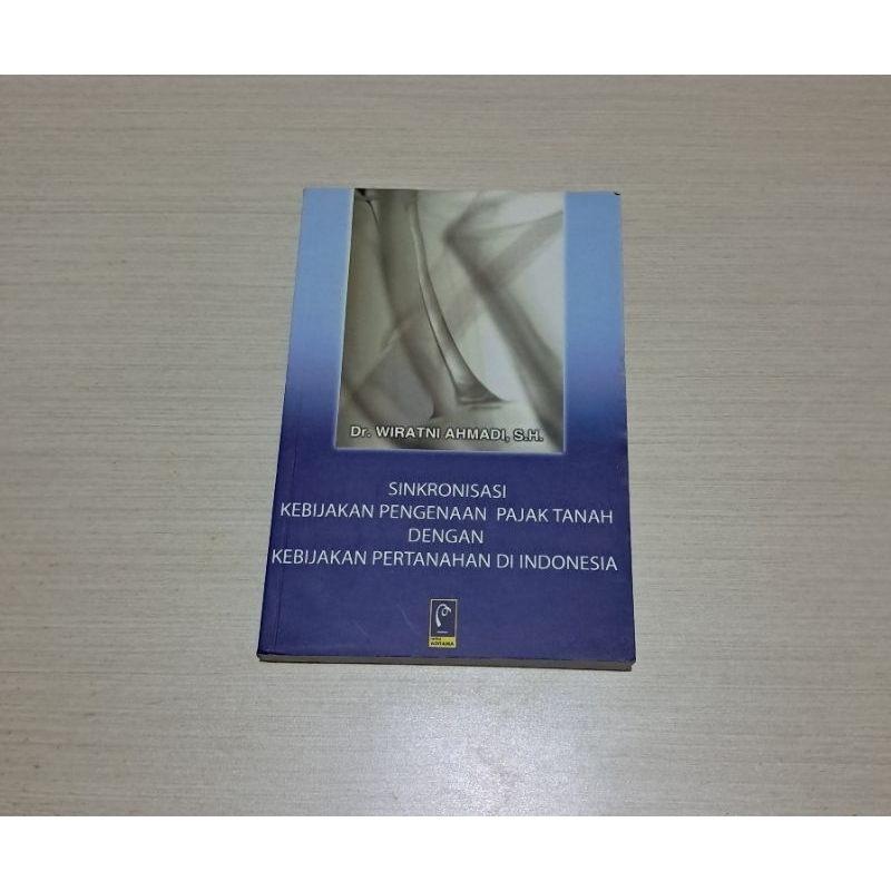 SINKRONISASI KEBIJAKAN PENGENAAN PAJAK TANAH DENGAN KEBIJAKAN PERTANAHAN DI INDONESIA