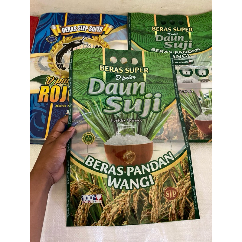 

kemasan beras merek daun suji plastik laminasi 5 kg 100 lembar