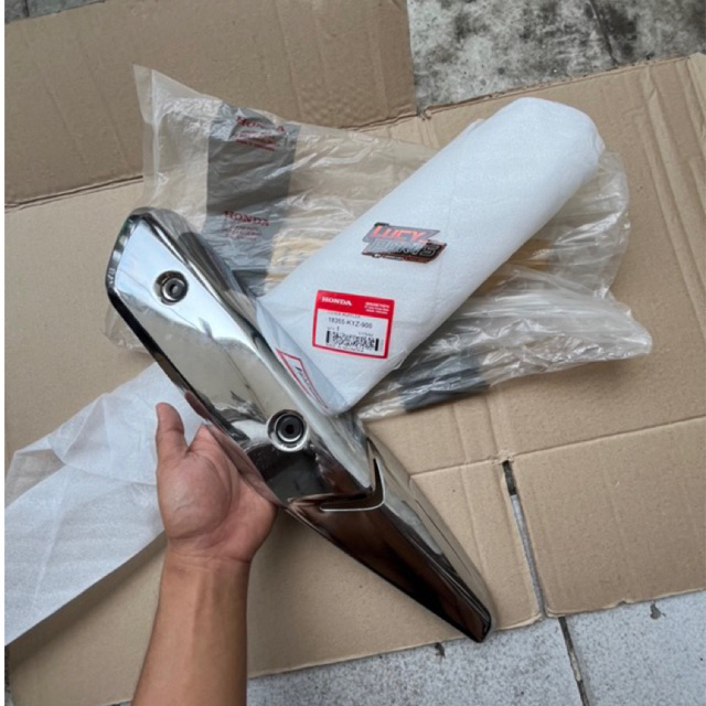 COVER TAMENG KNALPOT SUPRA X 125 HELM IN KYZ 18355-KYZ-900