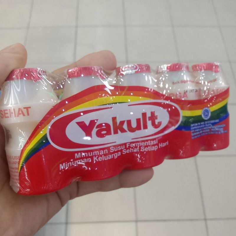 

Yakult fermentasi milk original / Yakult light less sugar