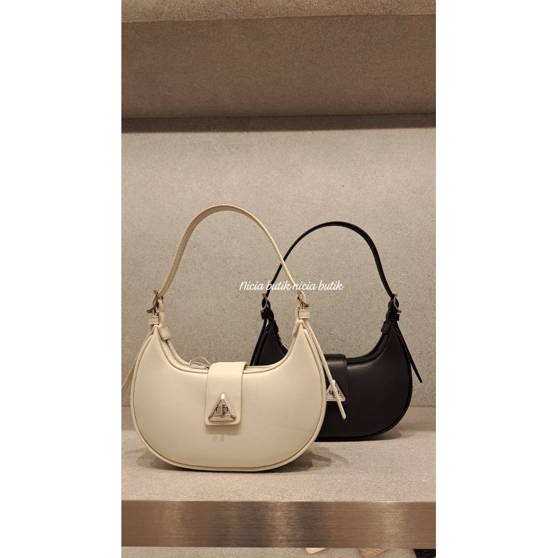 tas ck belted metallic accent trice