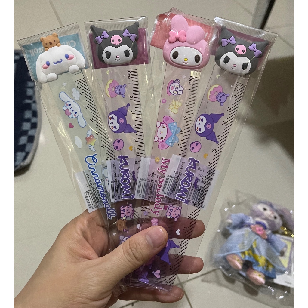 

penggaris motif kepala cartoon