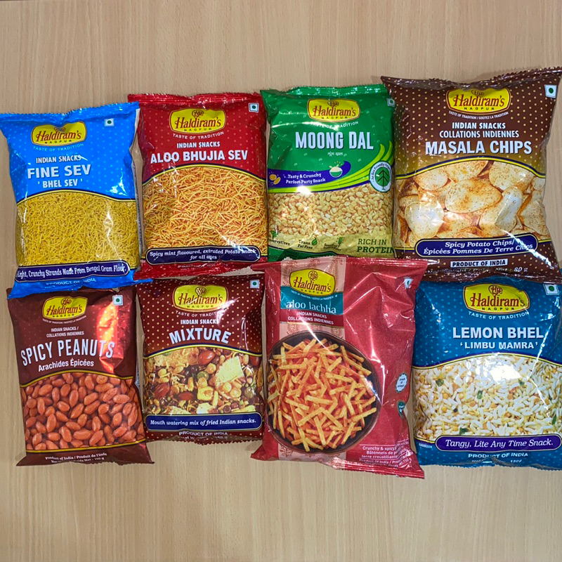 

Haldiram’s Snacks :- Aloo Bhujia / Fine Sev / Salted Peanuts / Moong dal / Mixture / Masala Chips / Spicy Peanuts / Aloo Lachha / Lemon Bhel (150/ 80grams) (Haldiram’s Nagpur)