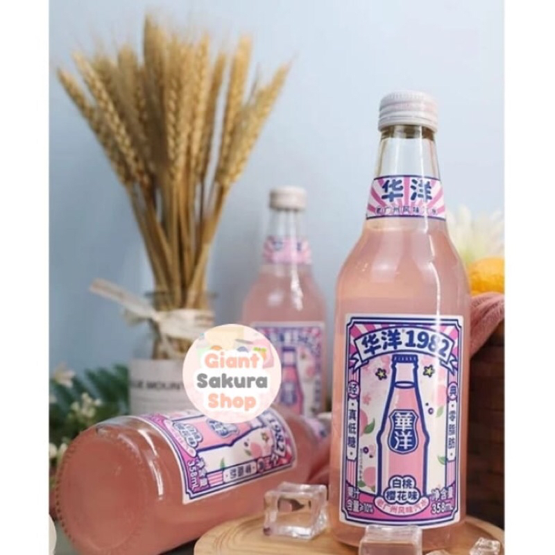 

Huayang Carbonated Drink White Peach Sakura Flavor / soft drink / minuman impor