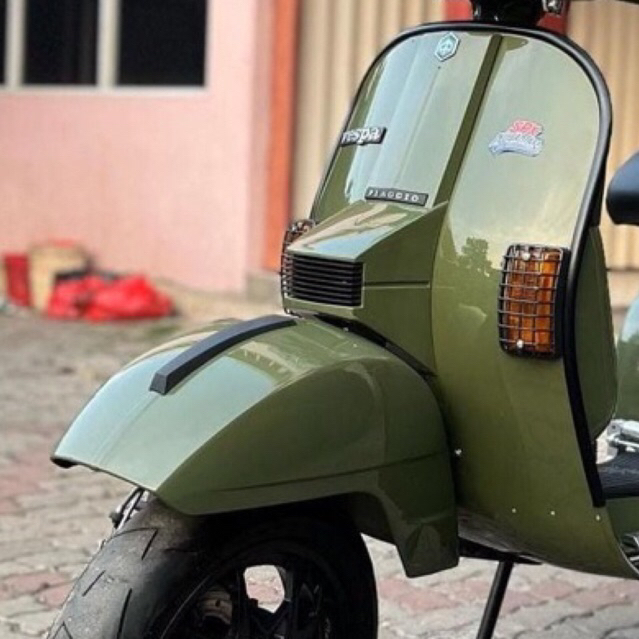 Cat motor vespa green solid