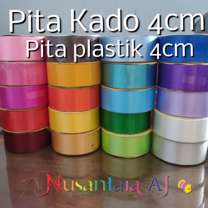 

Pita Kado 4cm, Pita kado 11/2", Pita Plastik lebar 4cm per roll