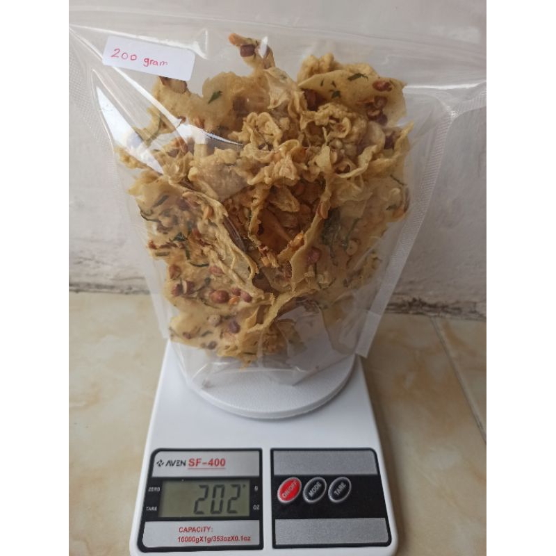 

Peyek kacang, teri, rebon, daun jeruk kemasan 200 gram