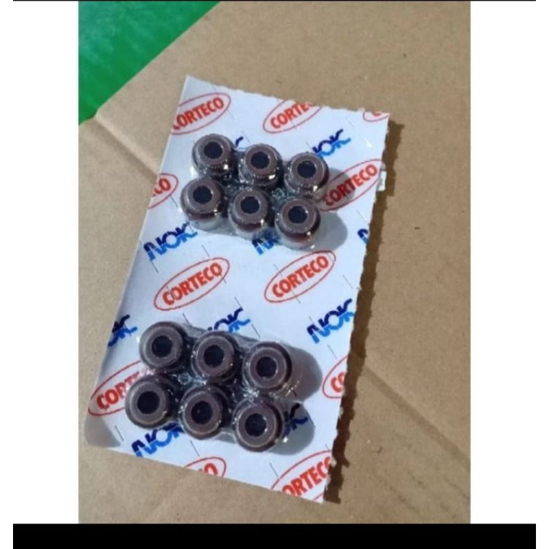 Seal Klep Mitsubishi T120ss Merk NOK Asli. Harga per 12pcs