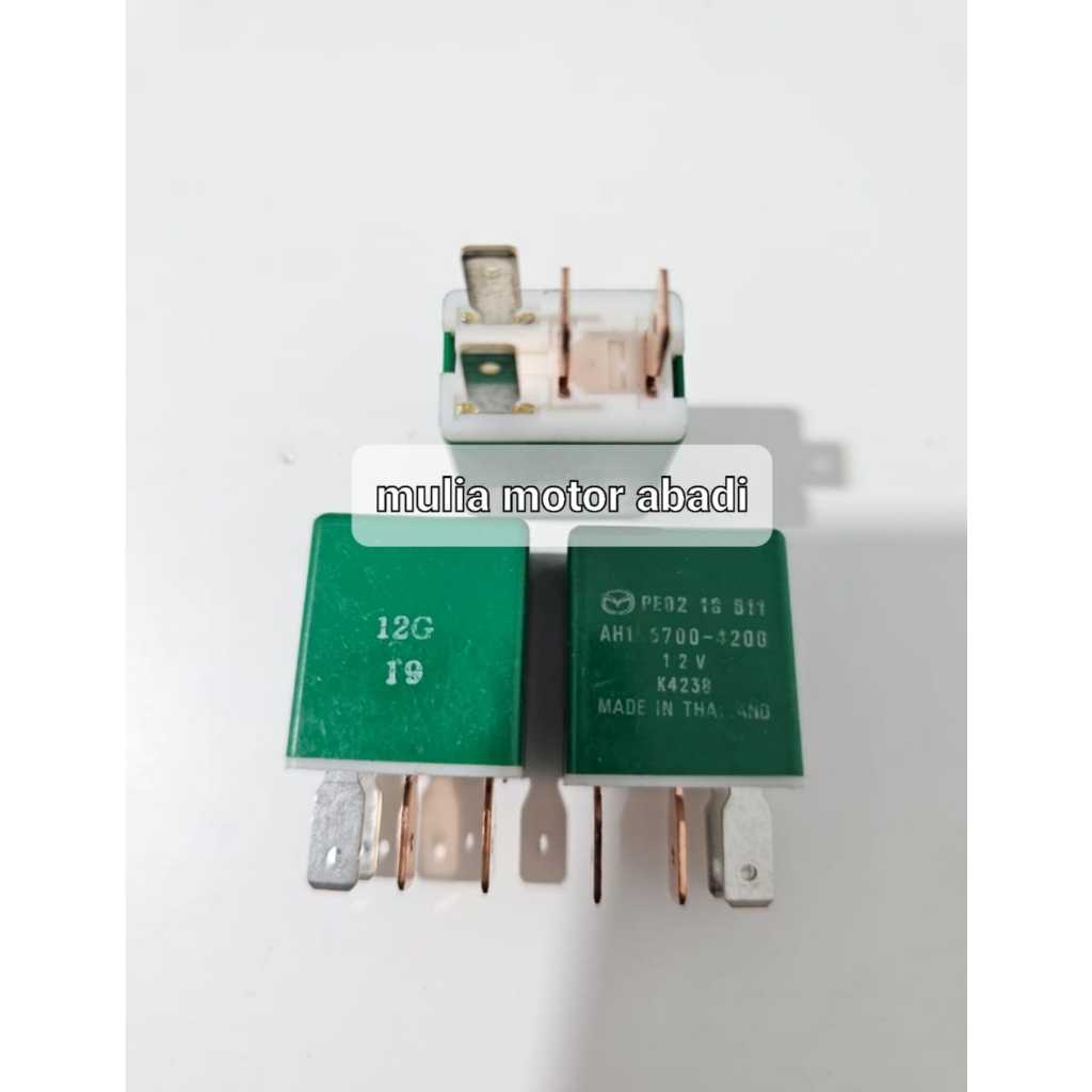 Relay lampu Mazda 12v kaki 4 original