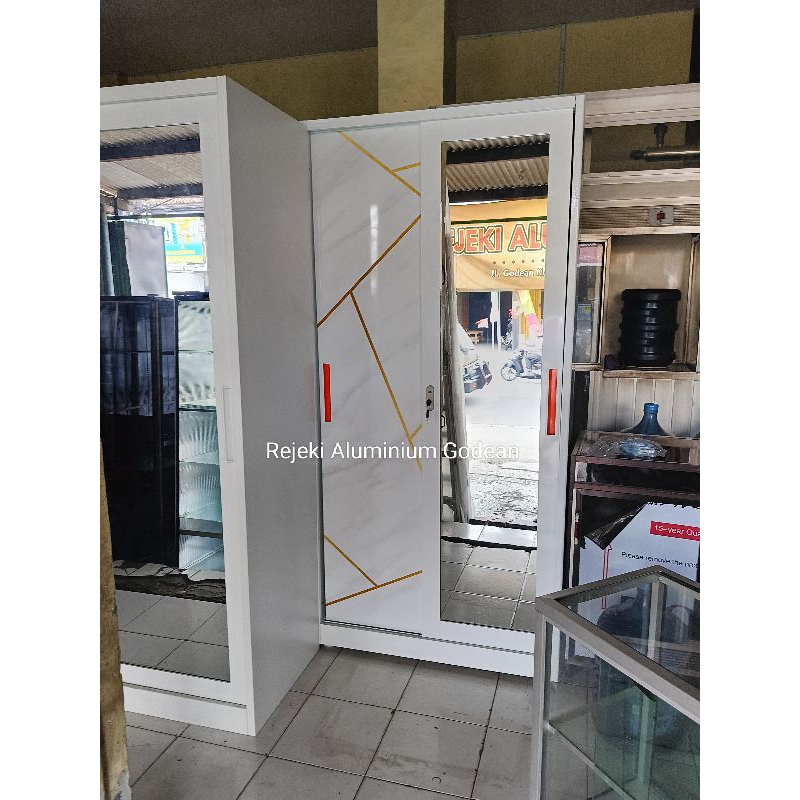 Lemari Baju Pakaian Besi Sleding