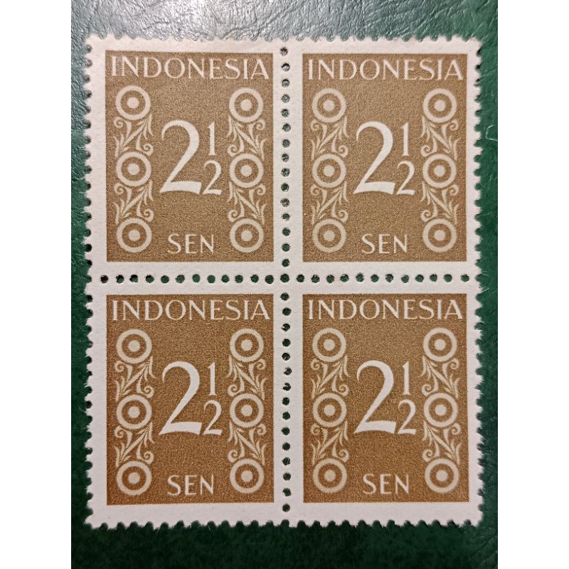 

Prangko Indonesia 2½ Sen Blok 4 Angka Smelt Tahun 1949 UN USED