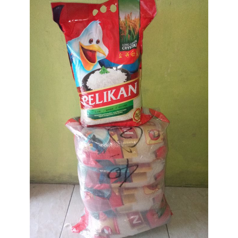 

Beras Pelikan kemasan 5Kg