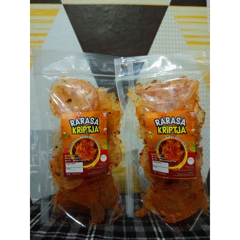 

KRIPCA/KERIPIK KACA/KERIPIK BELING PEDAS BALADO GURIH DAUN JERUK 50GR