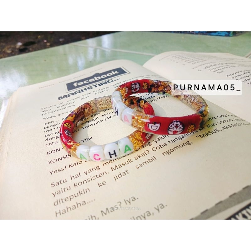 Gelang nama doraemon merah