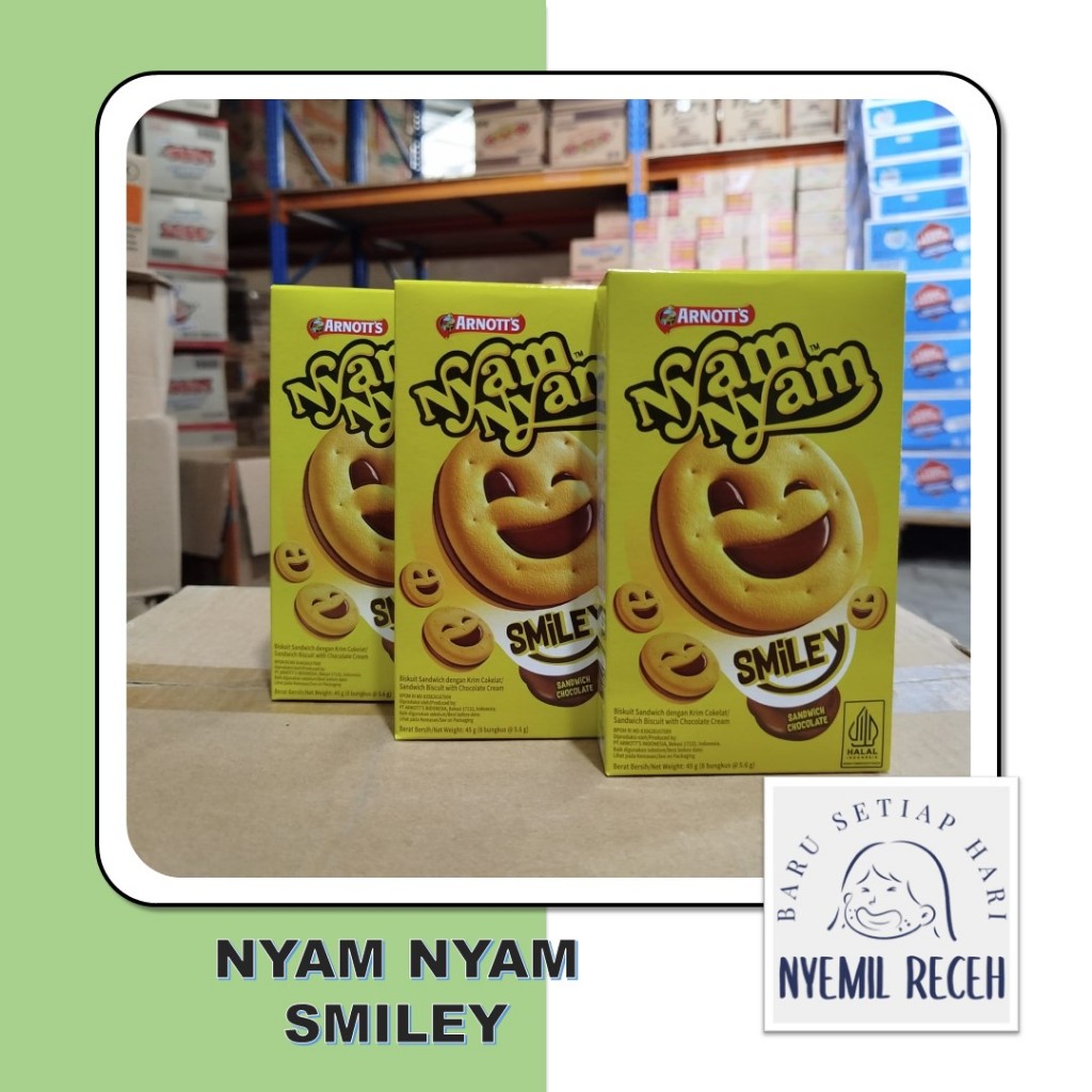 

Nyam Nyam Smiley Sandwich Chocolate Kemasan Besar 45Gr Biskuit Coklat Lucu