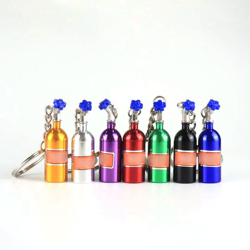 Wadah Obat Travel Bentuk Botol Gantungan Kunci Souvenir