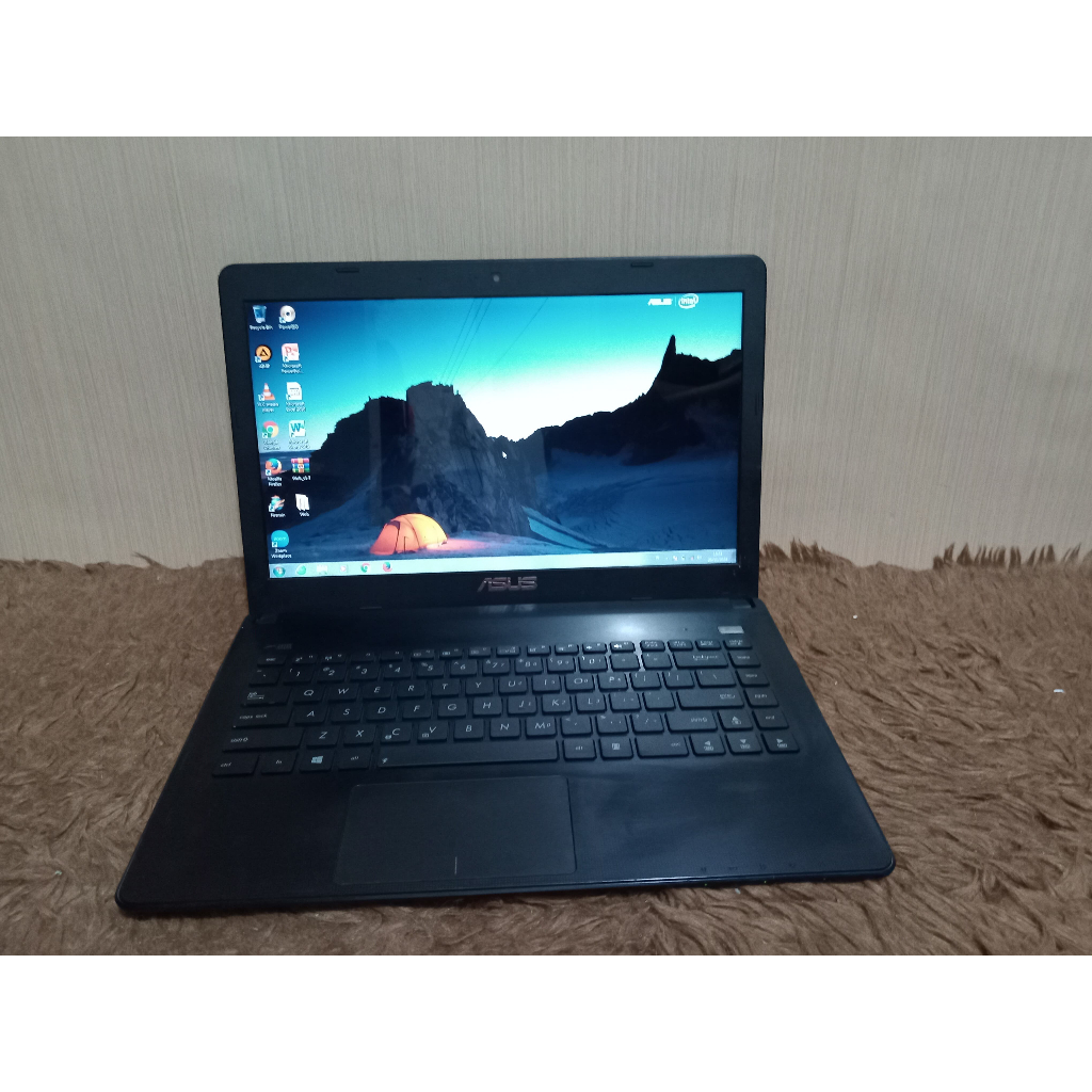 Laptop Asus X401U ram 2gb hdd 320gb amd c60 no minus dan murah