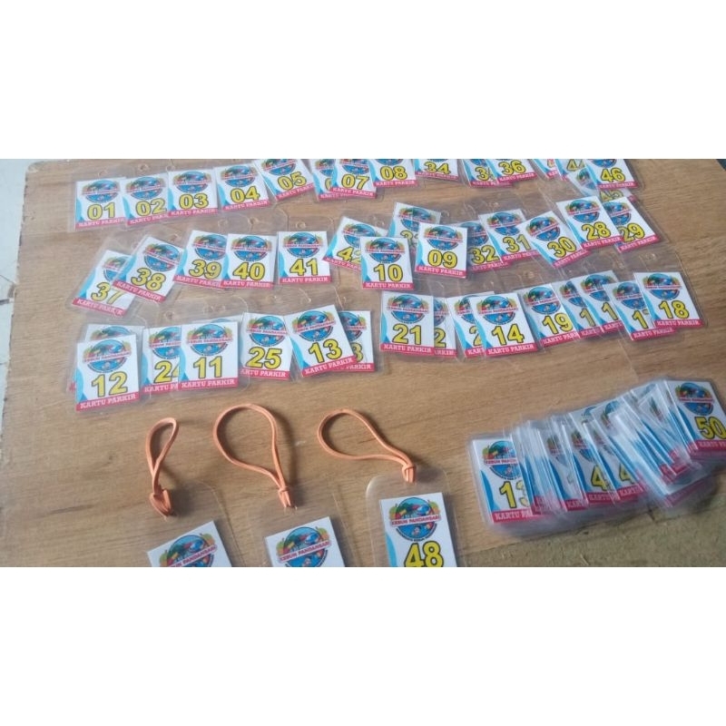 

KARTU PARKIR CUSTOM FREE DESAIN free karet . sudah laminasi anti air ukuran 3cmx4cm nomer pasangan berurutan 1-50