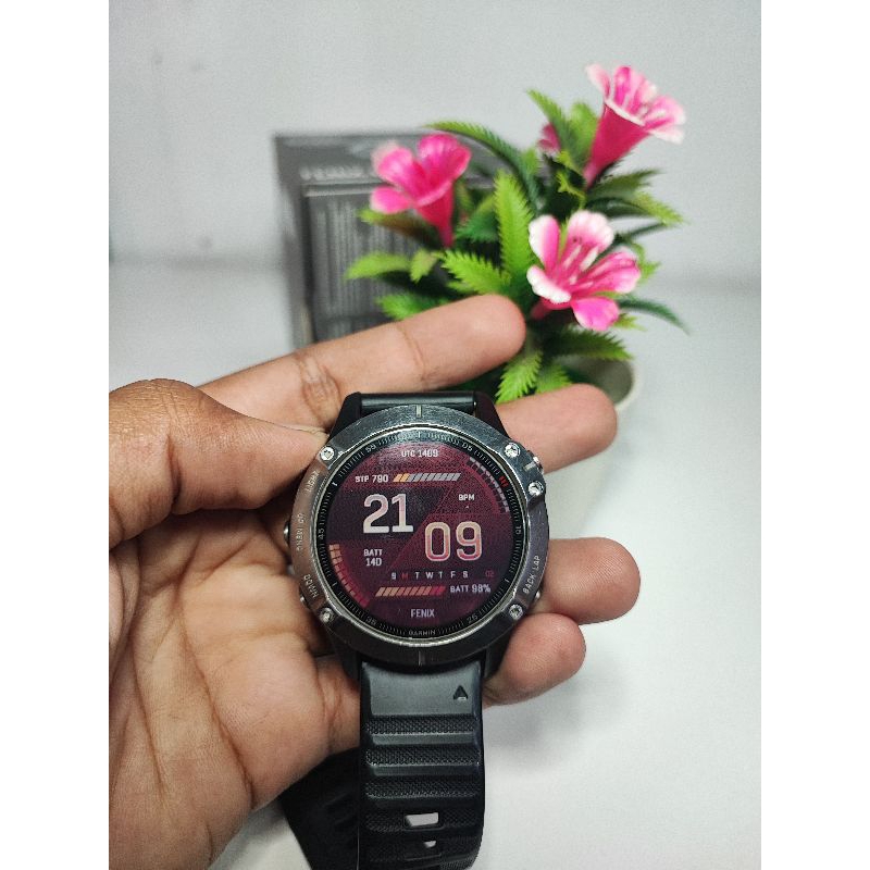 Garmin Fenix 6 second.