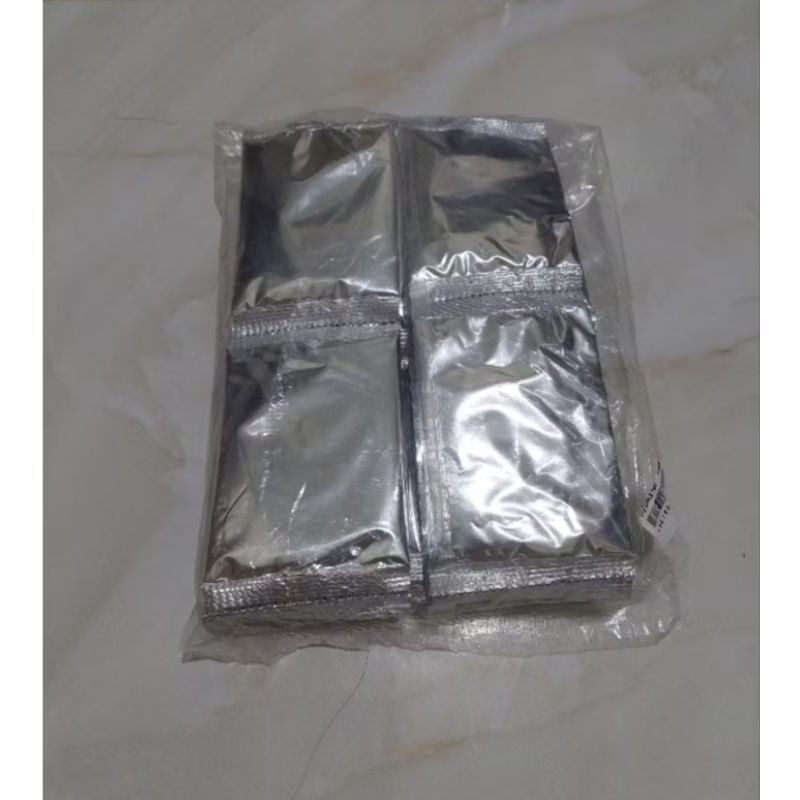 

Bubuk sachet es teh solo asli rasa strawberry isi 20 pcs