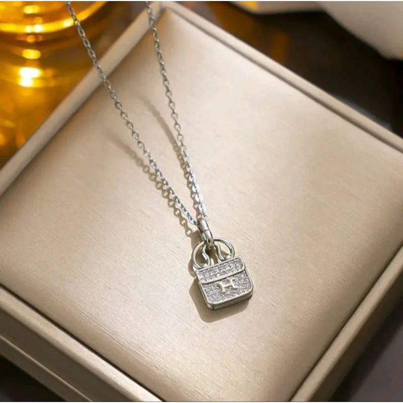 Serenescents06 Kalung Jurai Titanium Wanita Liontin Tas Anti Karat Perhiasan Wanita