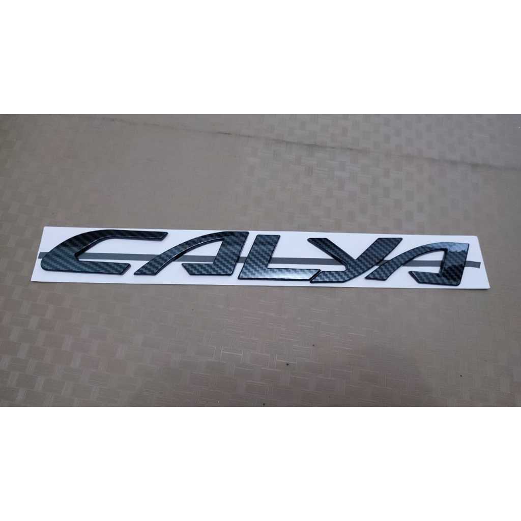 emblem kap mesin tulisan calya carbon