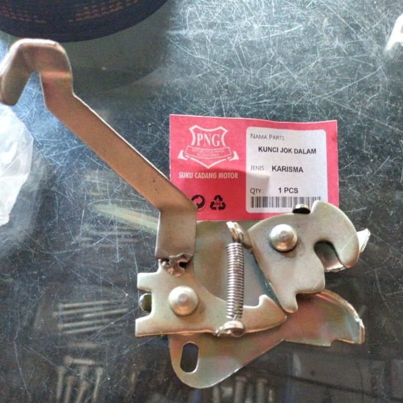 cepitan sadel / lawan kunci sadel jok karisma