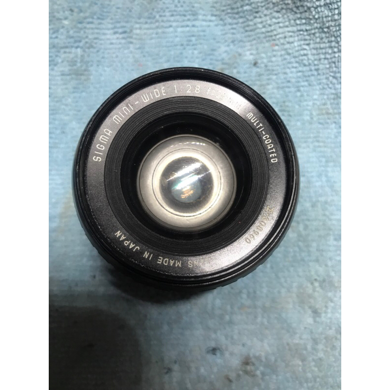 Lensa Sigma mini wide 28mm f2.8 mount Minolta Md gunakan sebagai parts penggantian
