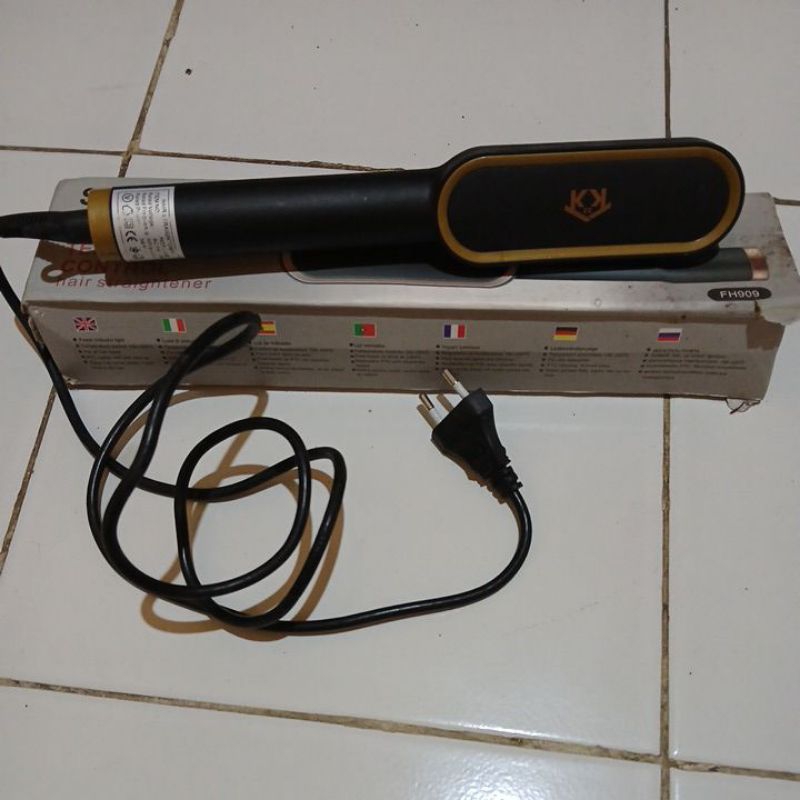 Catokan rambut sisir