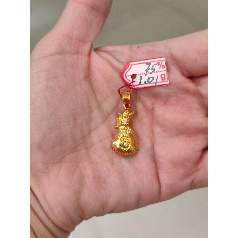 Liontin emas 75 kantong uang