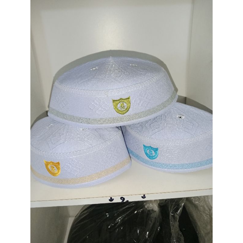 peci Malaysia ekslusif putih logo pedang kurma biru dan hijau ori produk abdul Hamid SKU 27
