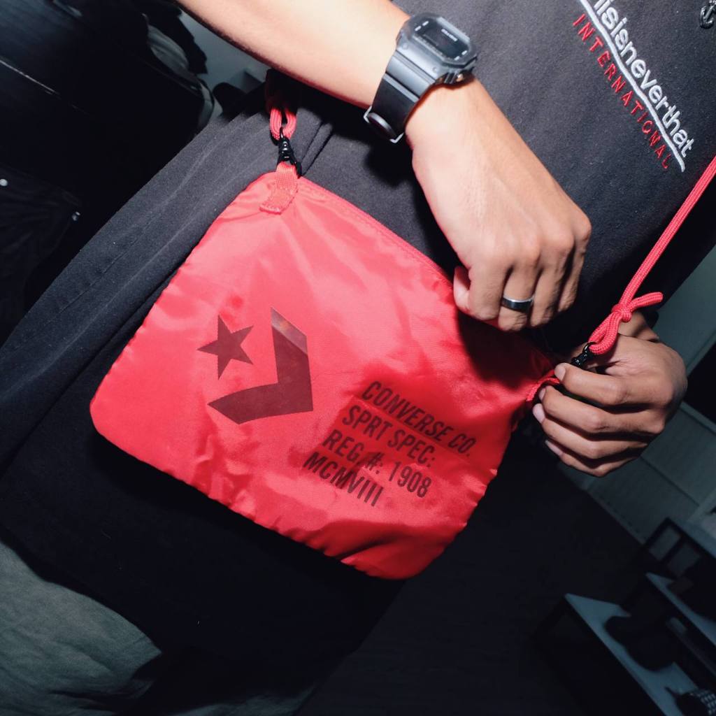 C*nverse pocket string bag red