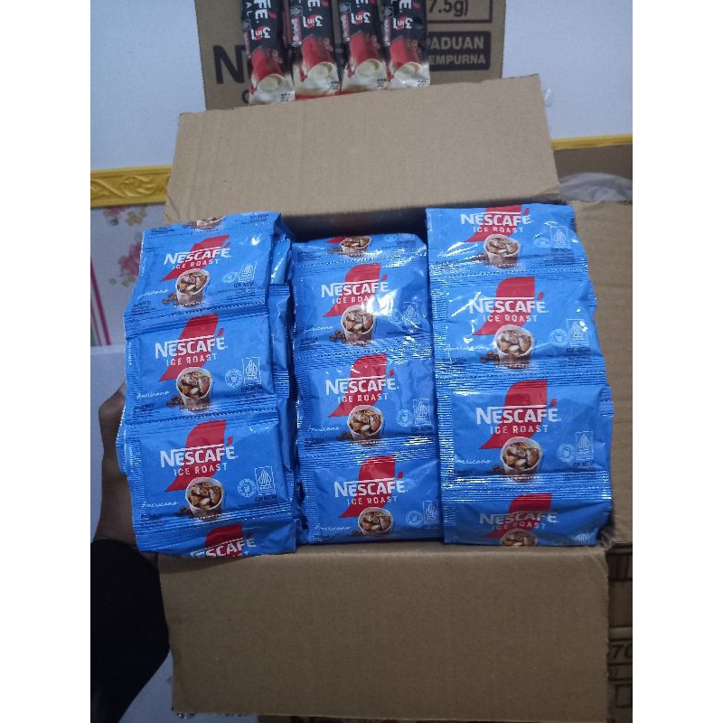 

Kopi Nescafe Ice Roast americano 2g 1rtg isi 10pcs