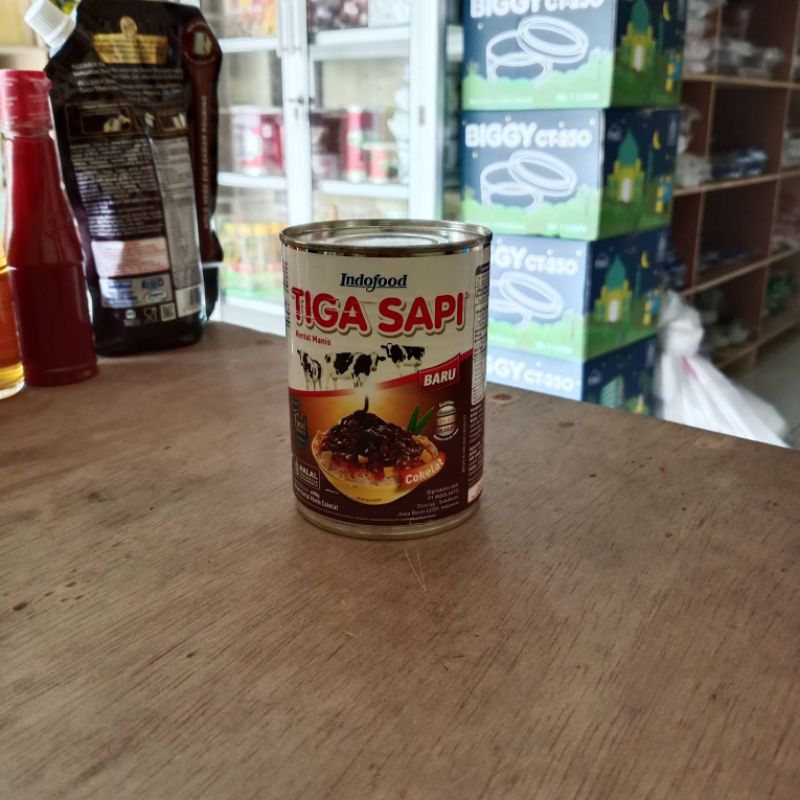 

SUSU TIGA SAPI COKLAT KALENG