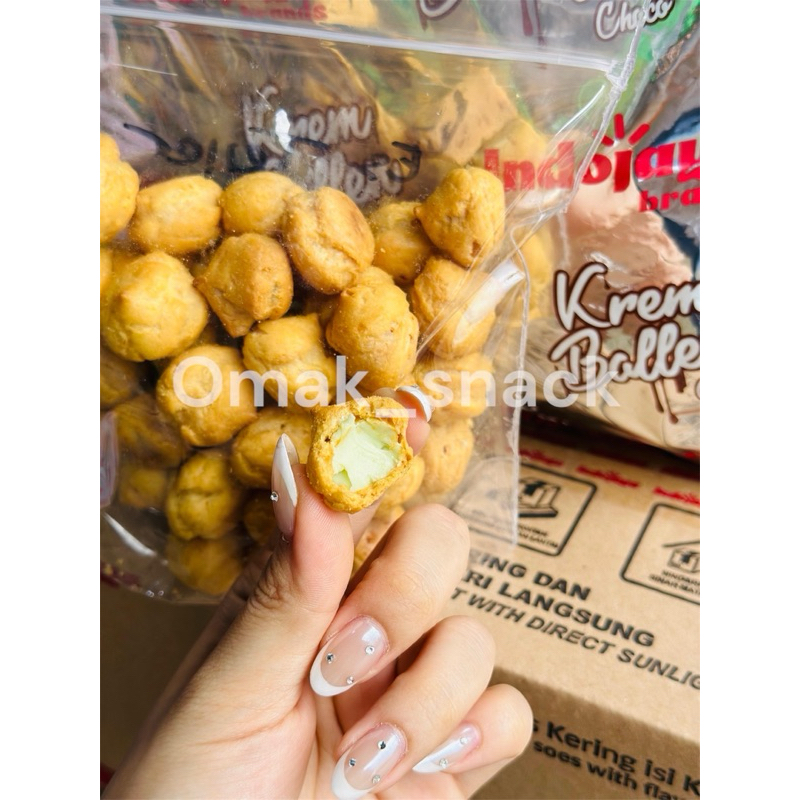 

Omak Snack [ Soes Krem Ballen 1 Dus isi 2 Kg ] rasa coklat, es teler, dan klepon