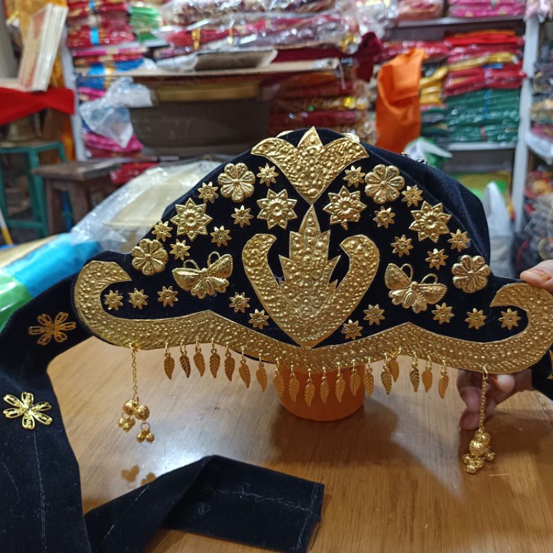 topi suntiang solok