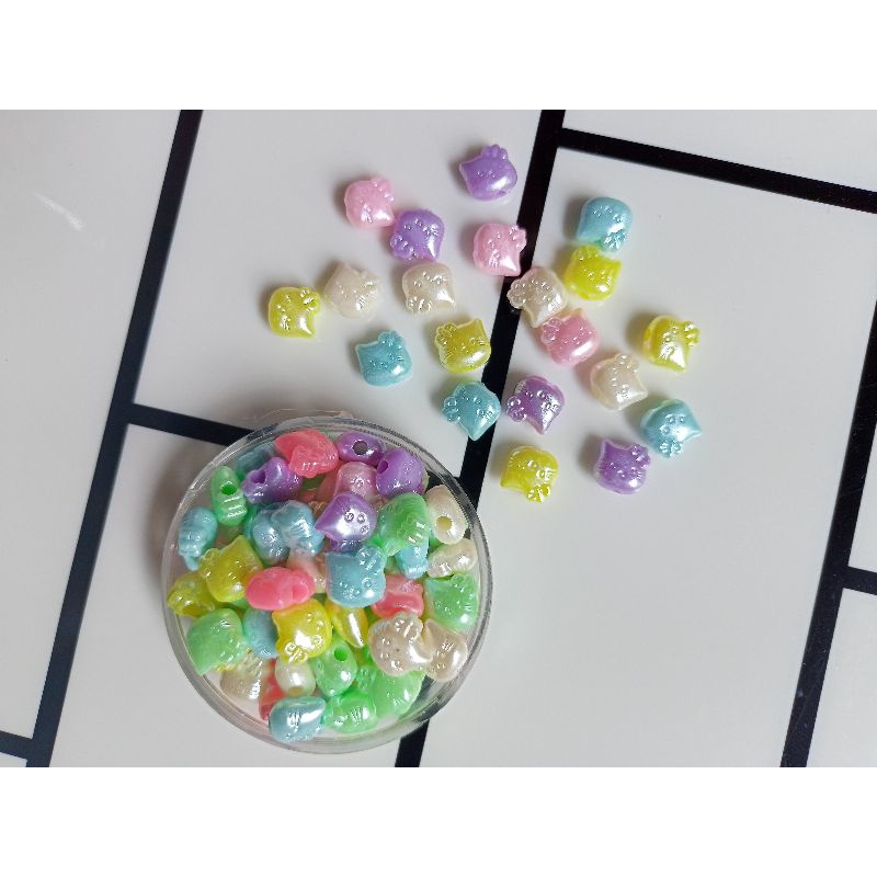 manik kitty lubang atas bawah