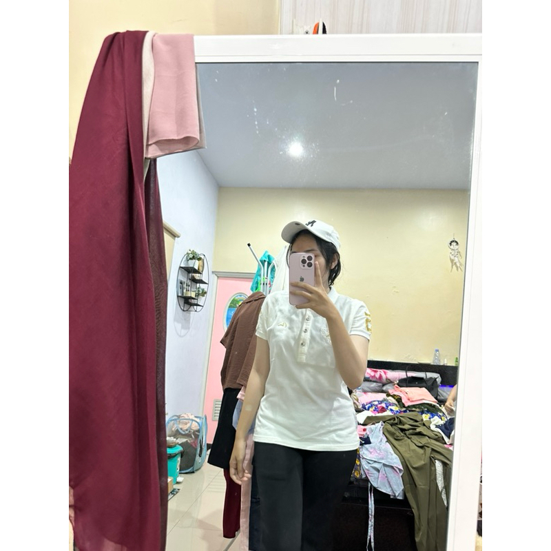 baju polo wanita putih