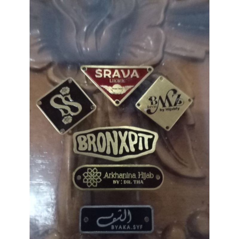 label plat hijab besi