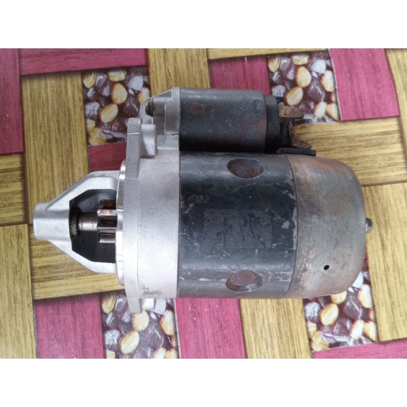Dinamo starter Mitsubishi COLT T120SS karbu/L300 bensin(body besar)