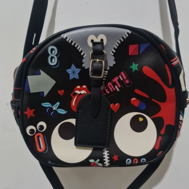 preloved HUER eye theme printed sling bag