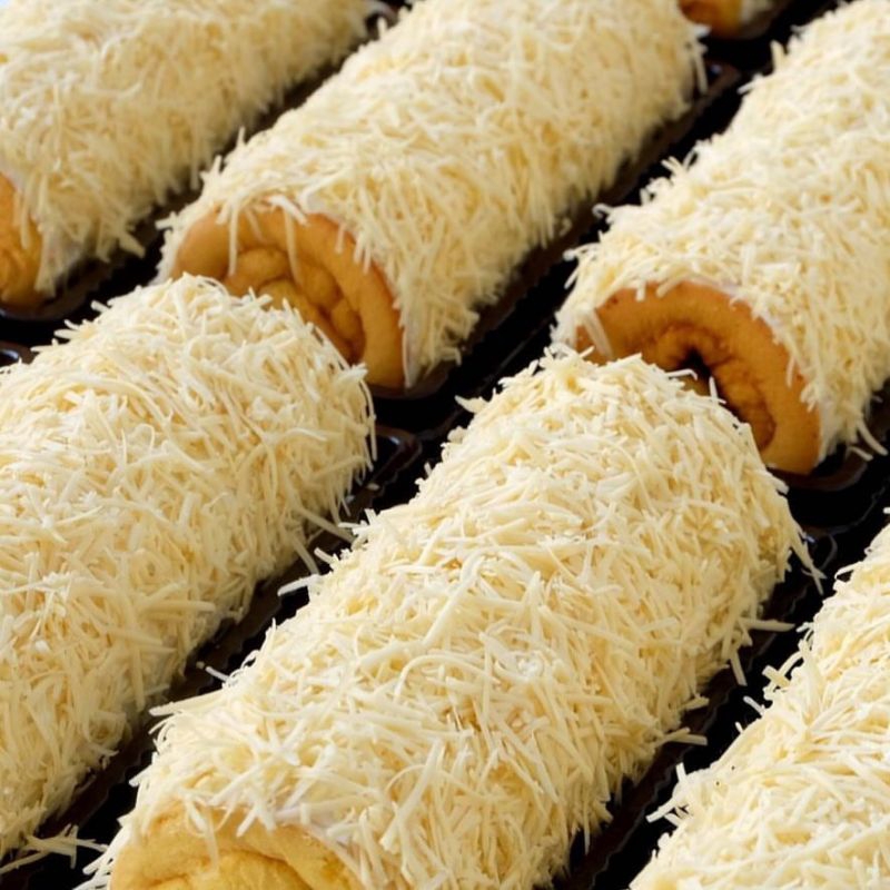 

Bolu Gulung Keju Topping Keju