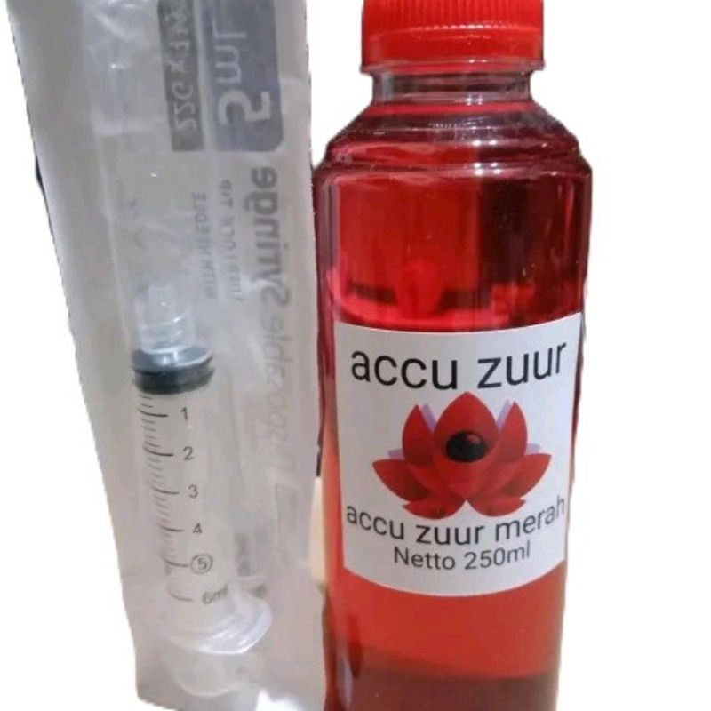 Air aki merah. air aki buat nambah aki kering yang lemah dan soak (netto 250ml)