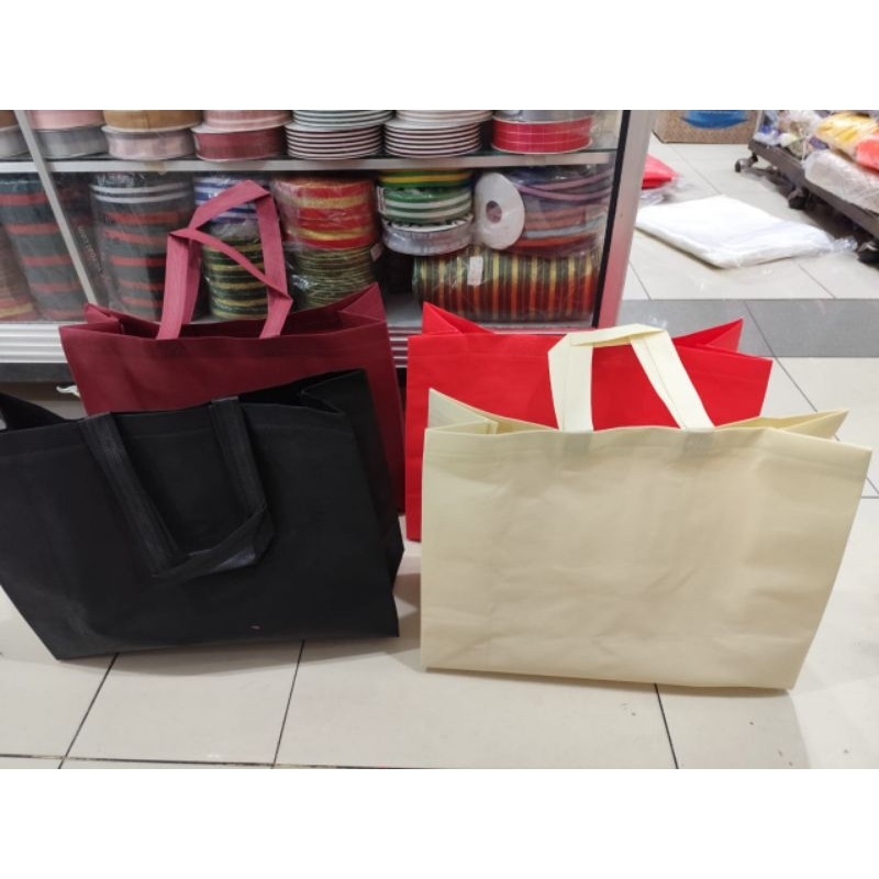 

tas kain spunbond model tidur atau landscape isi 12 pcs terlaris dan termurah