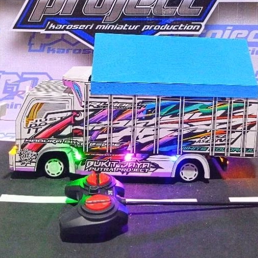 PROMO MINIATUR TRUK OLENG REMOT KONTROL MURAH FLL VARI LAMPU DAN TERPAL