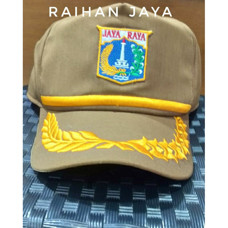 topi keki dki logo Lis padi kapas