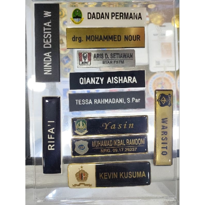 

Baju partai Senen name tag