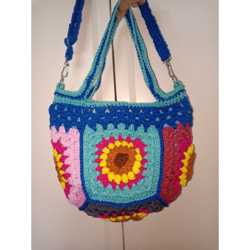 Tas rajut pantai bali motif bunga matahari