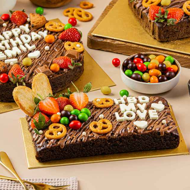 

Hertfelt Morsels Brownies Chan Patisserie Size 20x10cm Birthday Cake