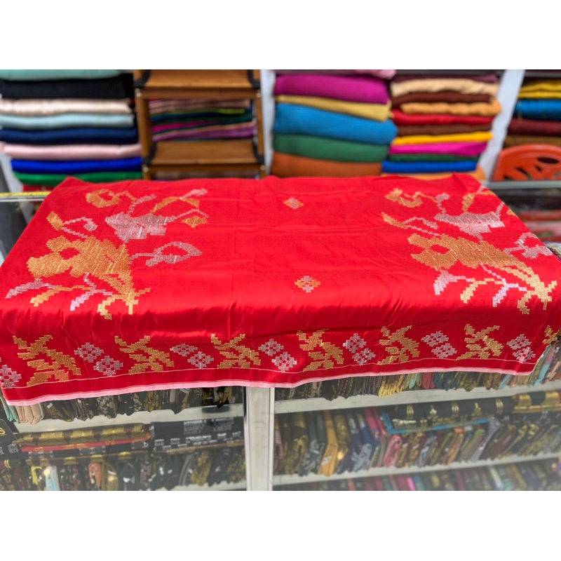 sarung/kain tenun lagosi